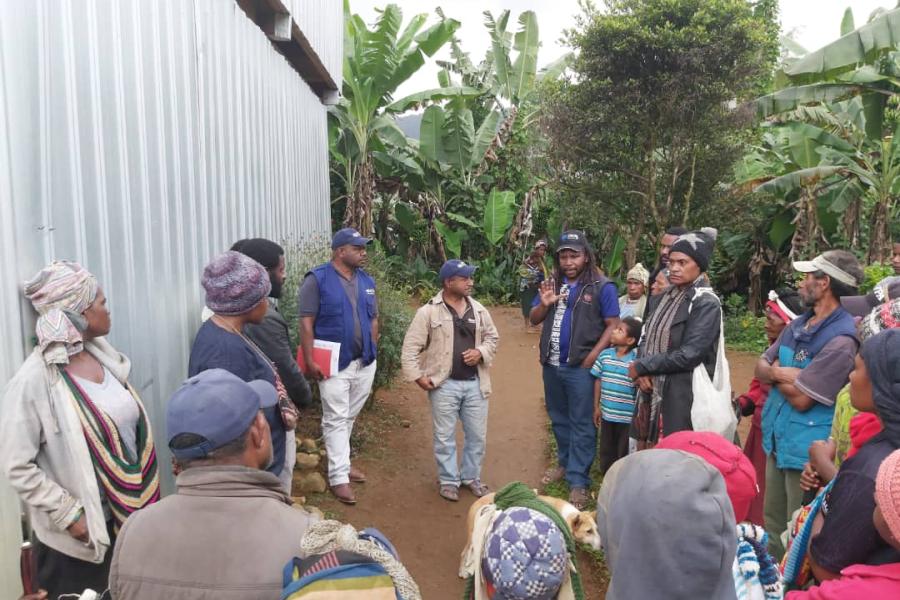 Group of people listening to instructions