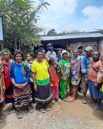 Women in Hela Province outside NGO building