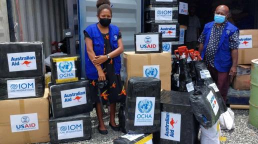 IOM staff packing Shelter NFIs for shipment to target locations